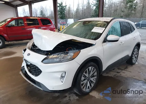 2021 Ford Escape Titanium Hybrid z USA, uszkodzony, nr VIN 1FMCU9DZ7MUB16787